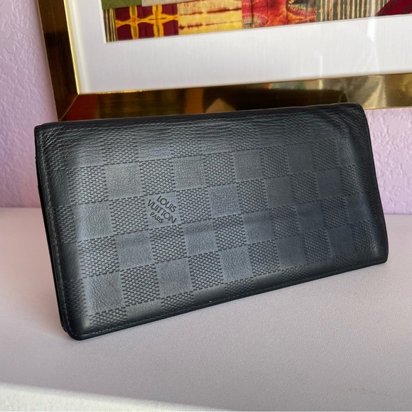 Authentic Louis Vuitton Men’s long leather Brazza wallet in Damier Black
